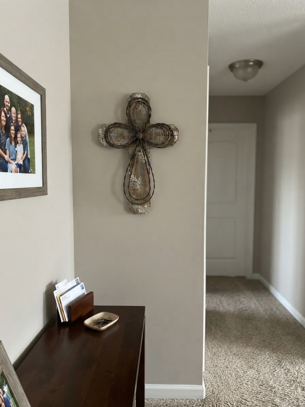 Handcrafted rustic wall cross made from distressed wood and  twisted metal wire